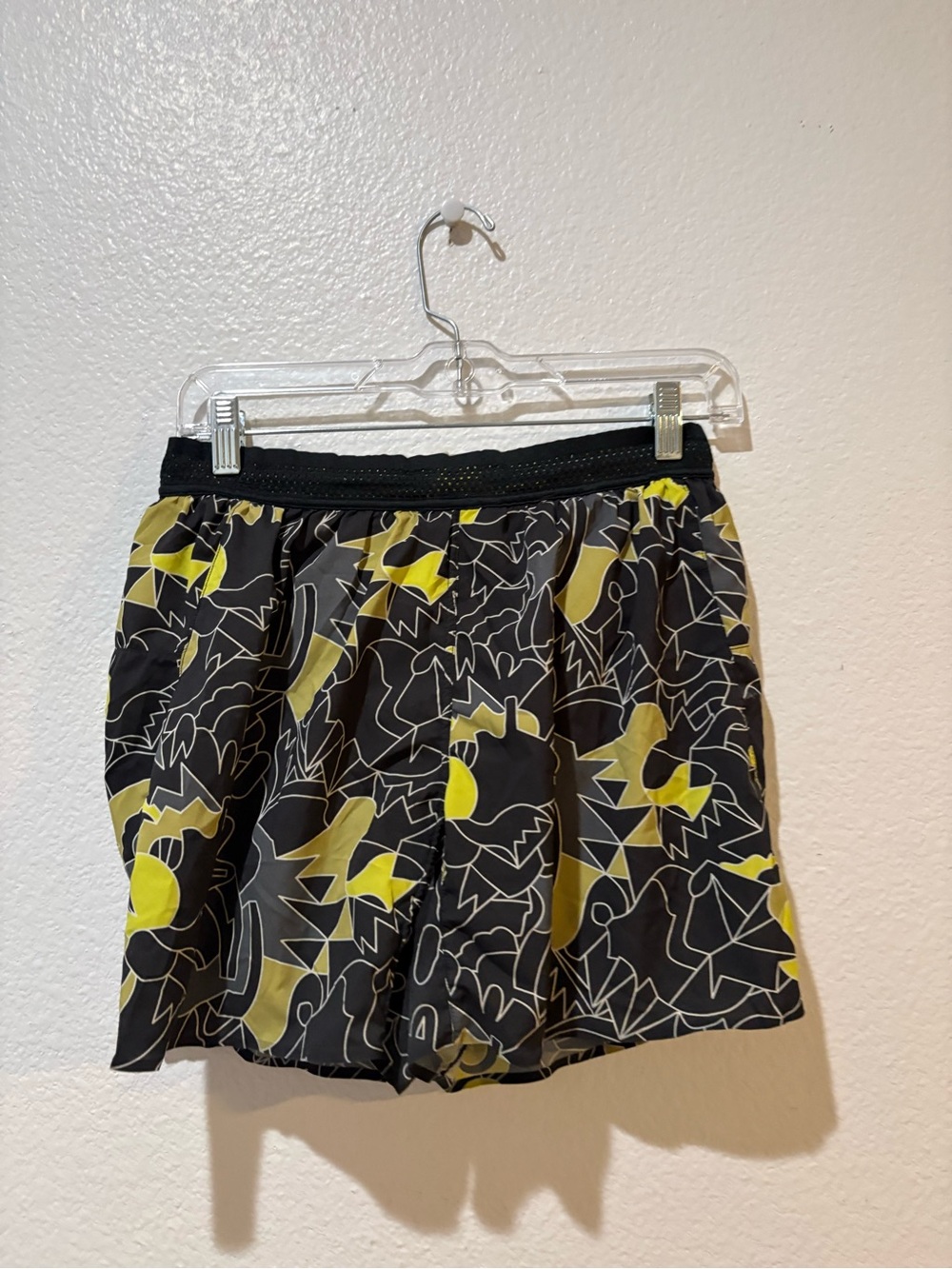 Janji Black Athletic Shorts with Yellow Abstract Print